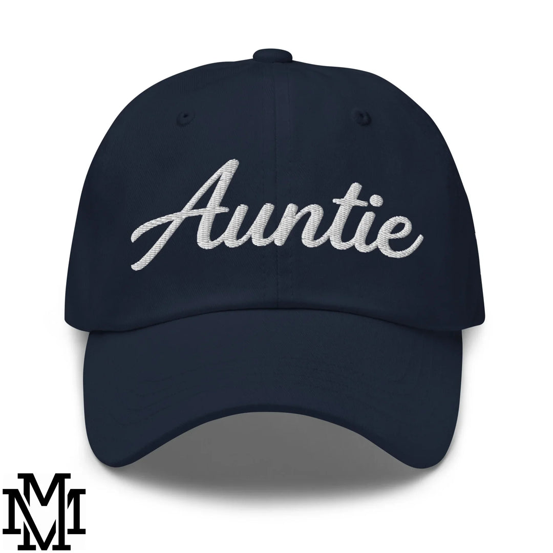 Navy blue unstructured dad hat with white embroidered cursive auntie lettering for celebrating family style