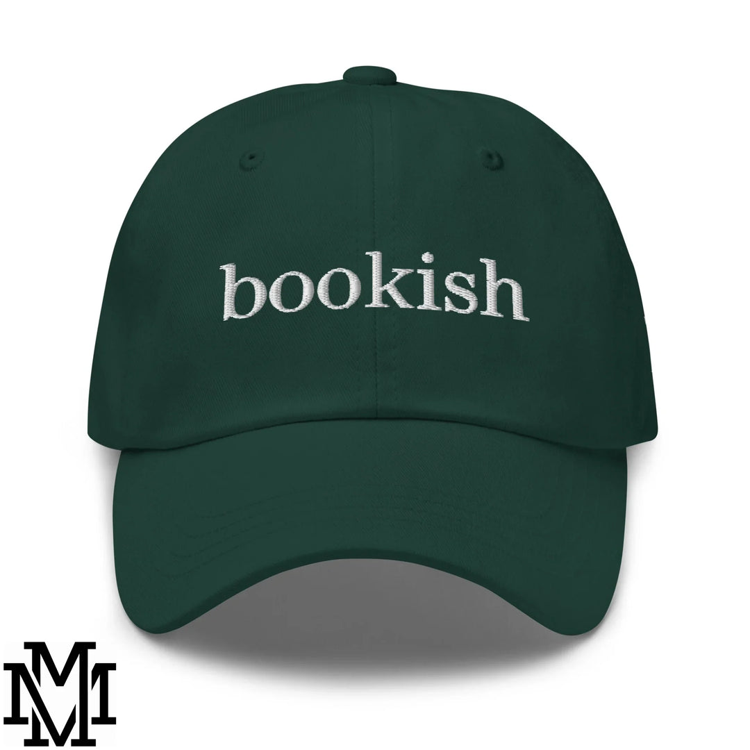 Dark green cotton unstructured dad hat with white embroidered bookish text perfect for literary fashion enthusiasts