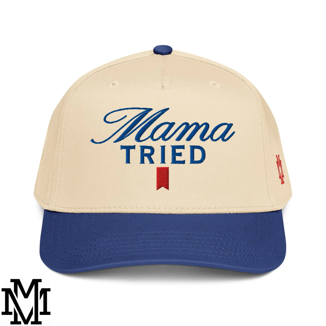 Beige and blue baseball snapback hat with embroidered mama tried cursive script and red bookmark design for effortless style