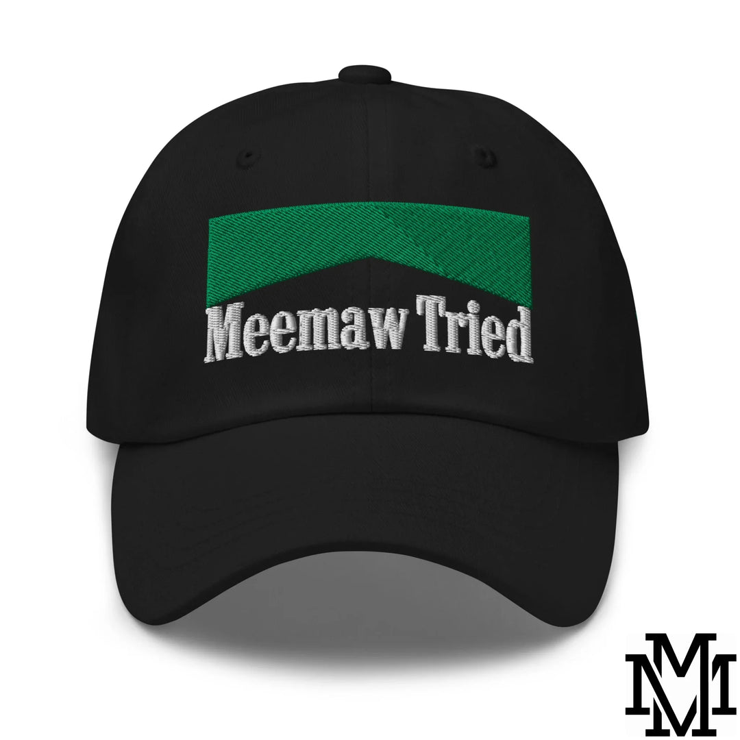 Black baseball cap with green embroidered banner and white meemaw tried text for casual menthol dad hat look
