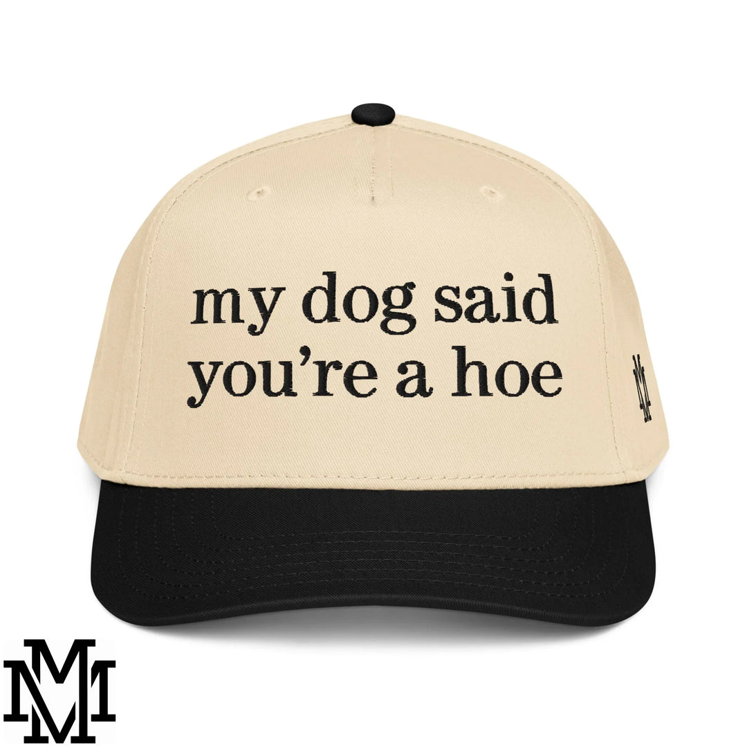 Beige and black embroidered baseball cap with my dog said youre a hoe text in bold sans-serif font for quirky humor