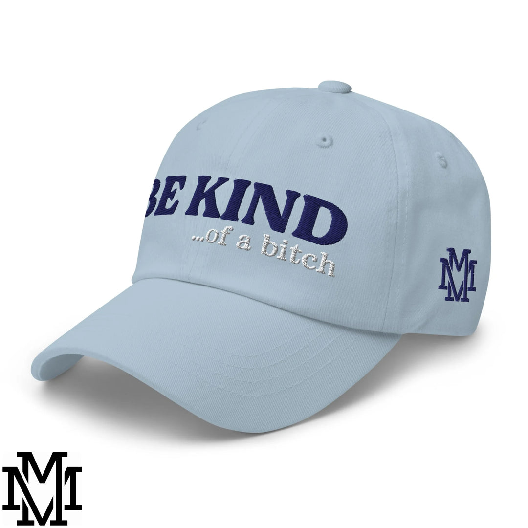 Light blue unstructured dad hat with navy blue embroidered be kind of a bitch text and matching side logo