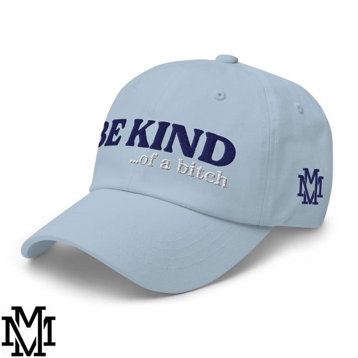 Light blue unstructured dad hat with navy blue embroidered be kind of a bitch text and matching side logo
