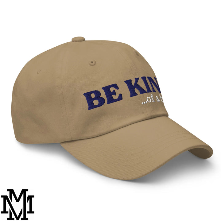 Beige unstructured dad hat with navy blue embroidered be kind of a text for casual wear