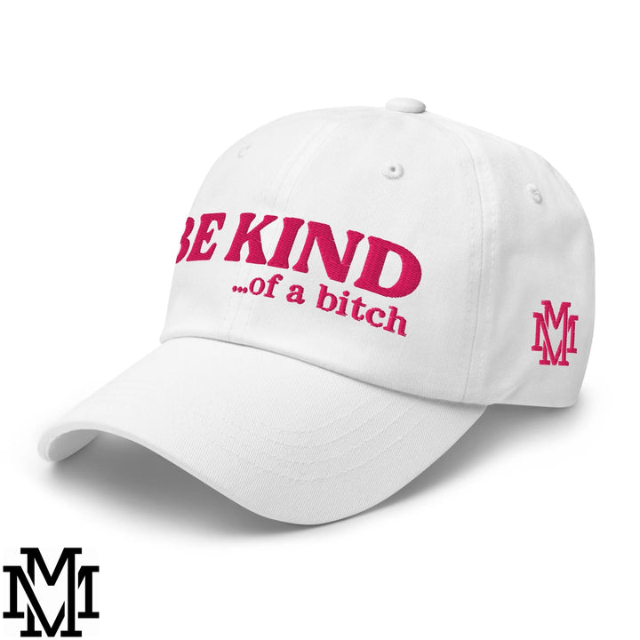 White unstructured dad hat with bold pink embroidered be kind of a bitch text and matching pink mm logo on the side