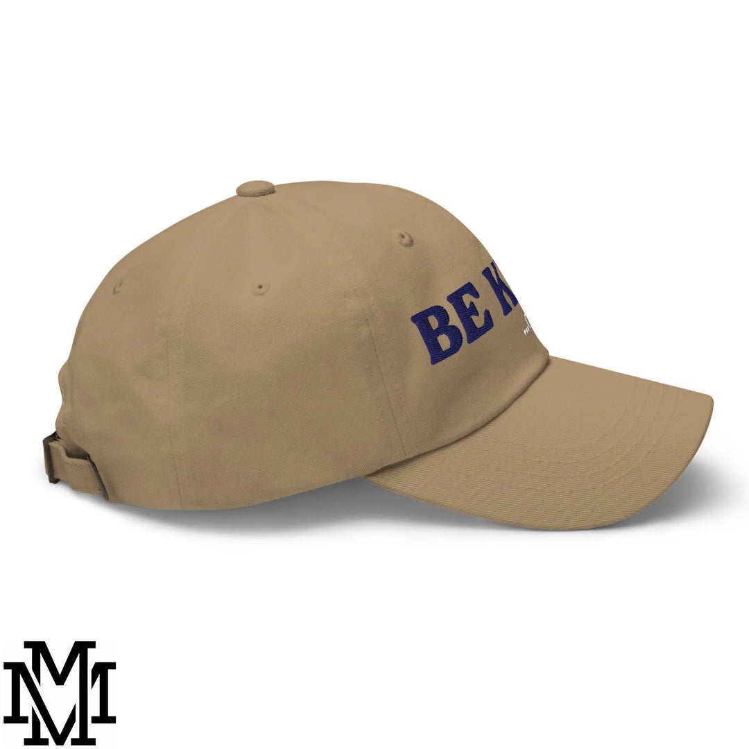 Beige unstructured dad hat with navy blue embroidered be kind of a bitch lettering baseball cap