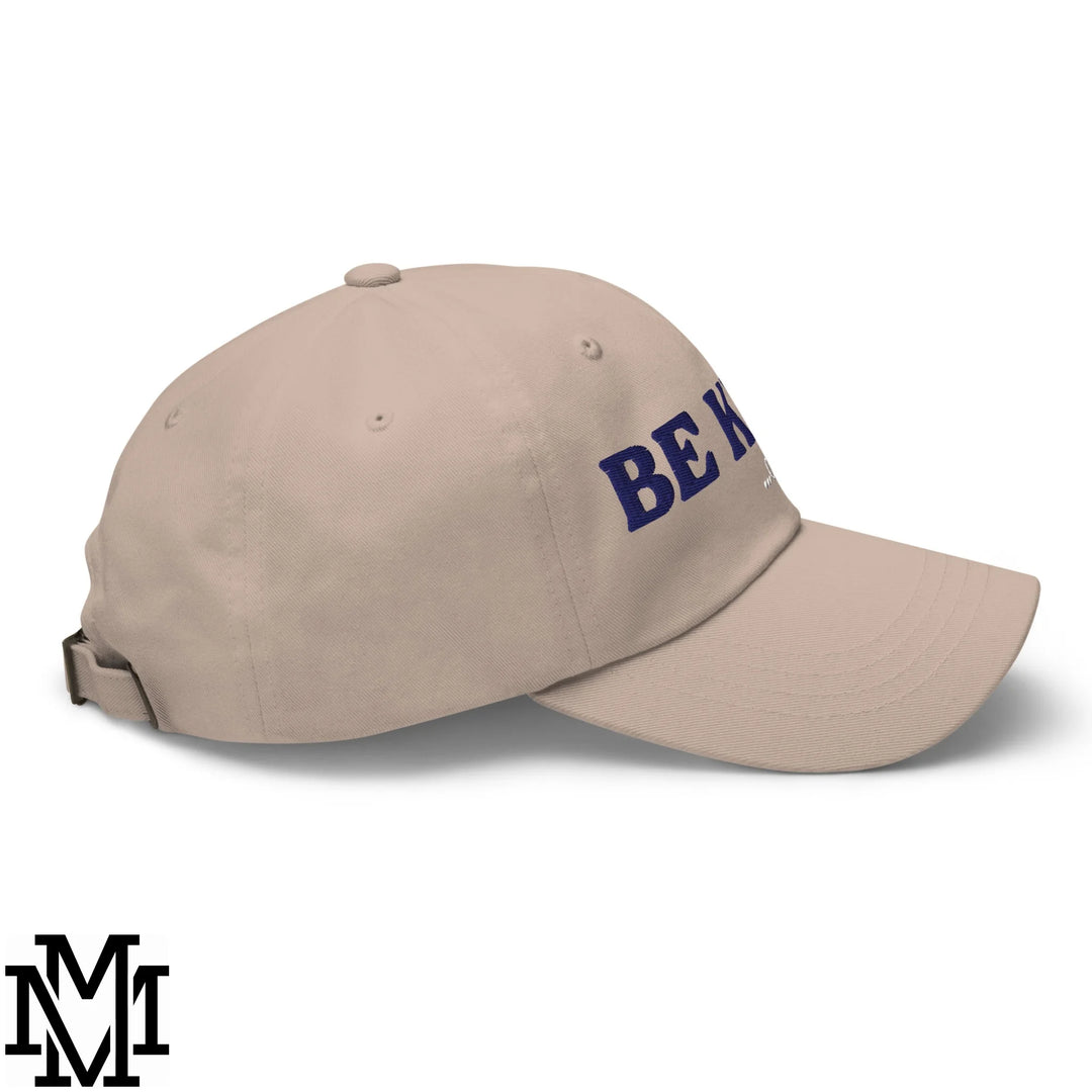 Beige unstructured dad hat with navy blue embroidered be kind of a bitch lettering baseball cap