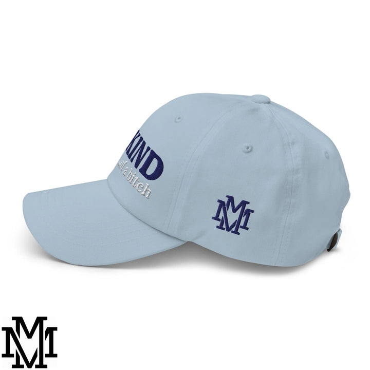 Light blue unstructured dad hat with navy embroidered kind and life bitch text and matching m logo on the side