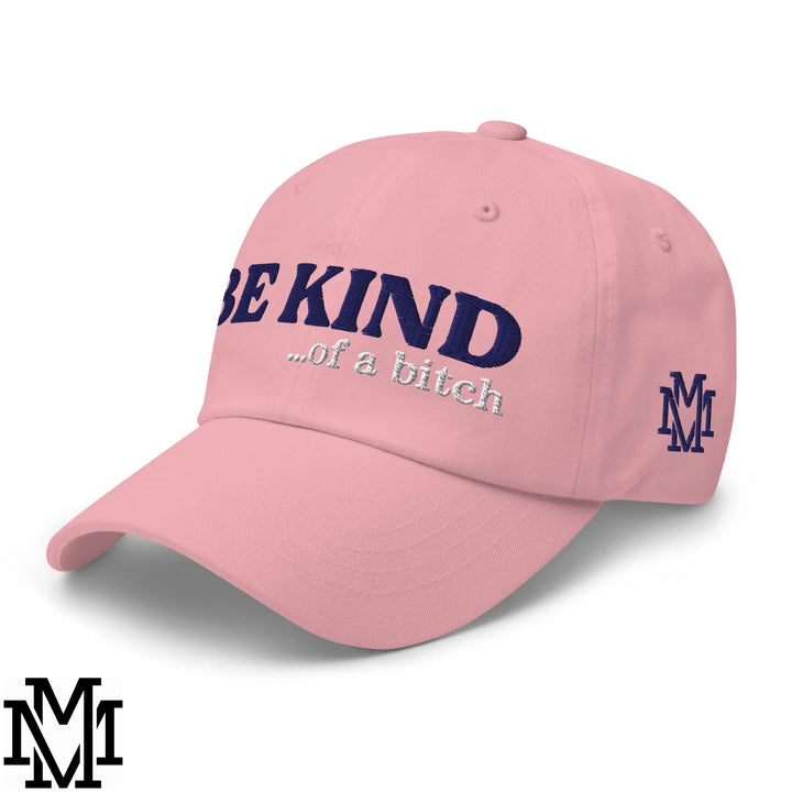 Pink embroidered unstructured dad hat with navy blue be kind of a bitch text and matching side logo