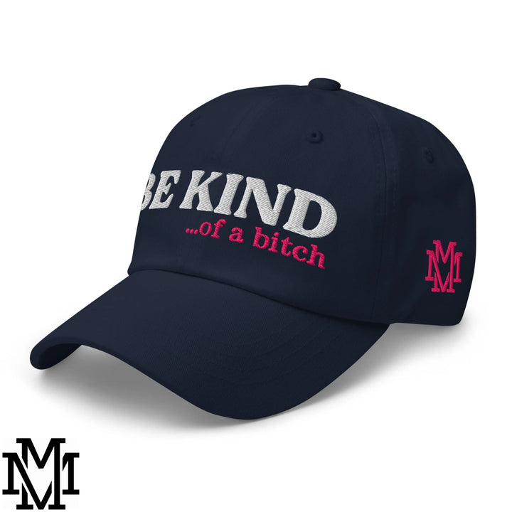 Navy blue unstructured dad hat with white and pink embroidered be kind of a bitch text and pink m logo on the side
