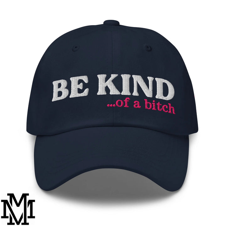 Navy blue unstructured dad hat with white and pink embroidered be kind of a bitch text for casual wear