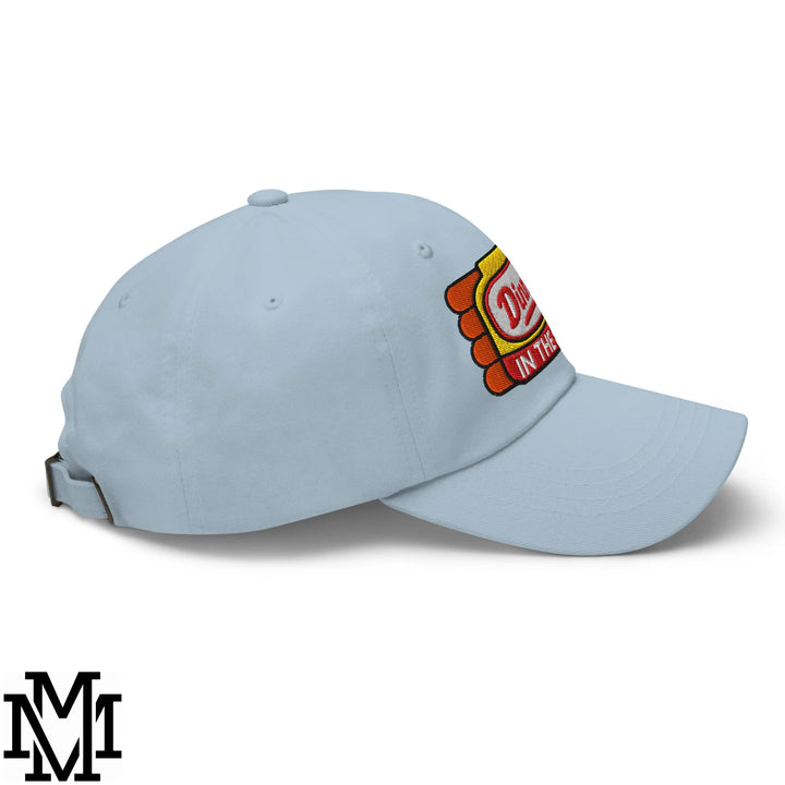 Light blue unstructured dad hat featuring a colorful embroidered patch with text dill pickle in the on the side