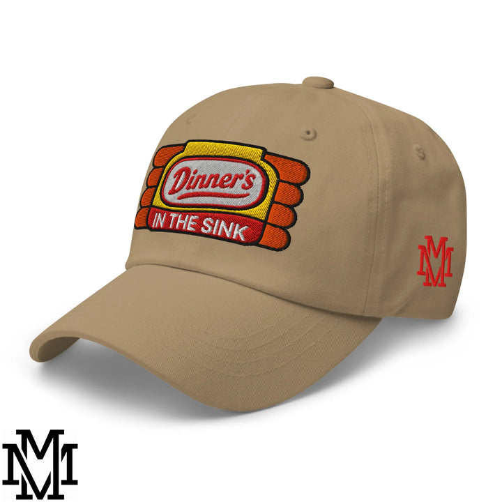 Beige dinner’s in the sink embroidered unstructured dad hat with red yellow logo and small red mm patch on the side