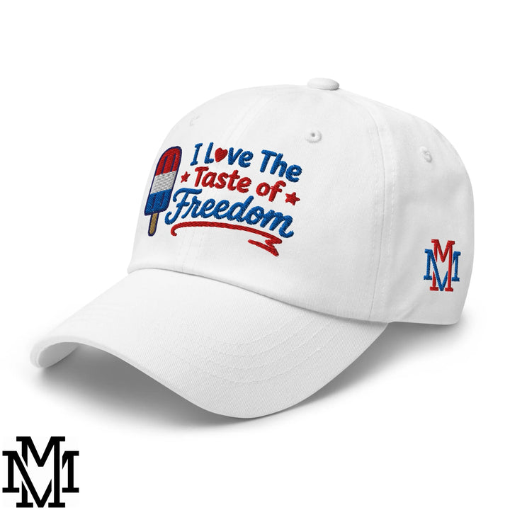 White unstructured dad hat with embroidered red white and blue i love the taste of freedom text and popsicle graphic
