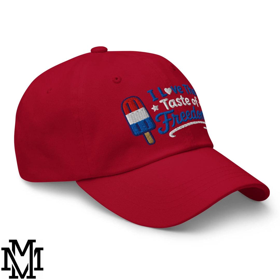 Red unstructured dad hat with embroidered patriotic popsicle and i love the taste of freedom text for 4th of july