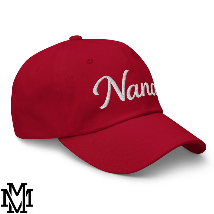 Red unstructured dad hat with white embroidered nana script on the front made of soft cotton blend