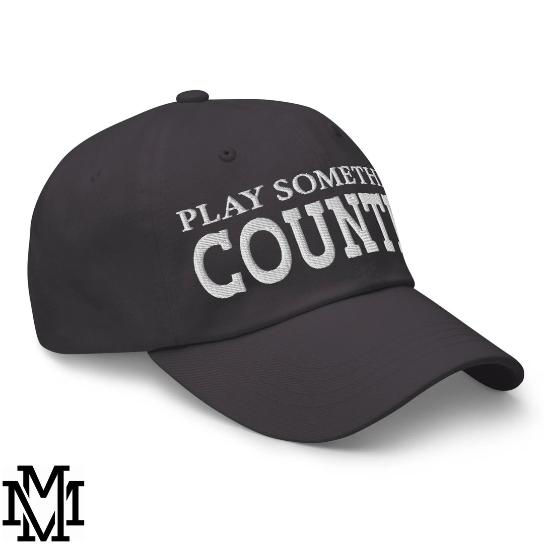 Black unstructured dad hat with white embroidered play something country text for casual outdoor wear