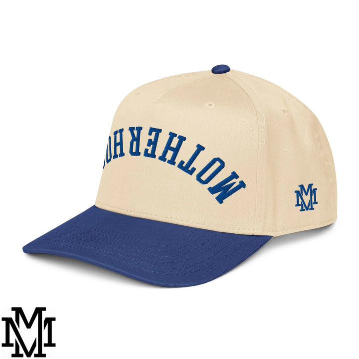 Beige and navy blue baseball cap with motherhood embroidered in bold blue and matching logo on the side