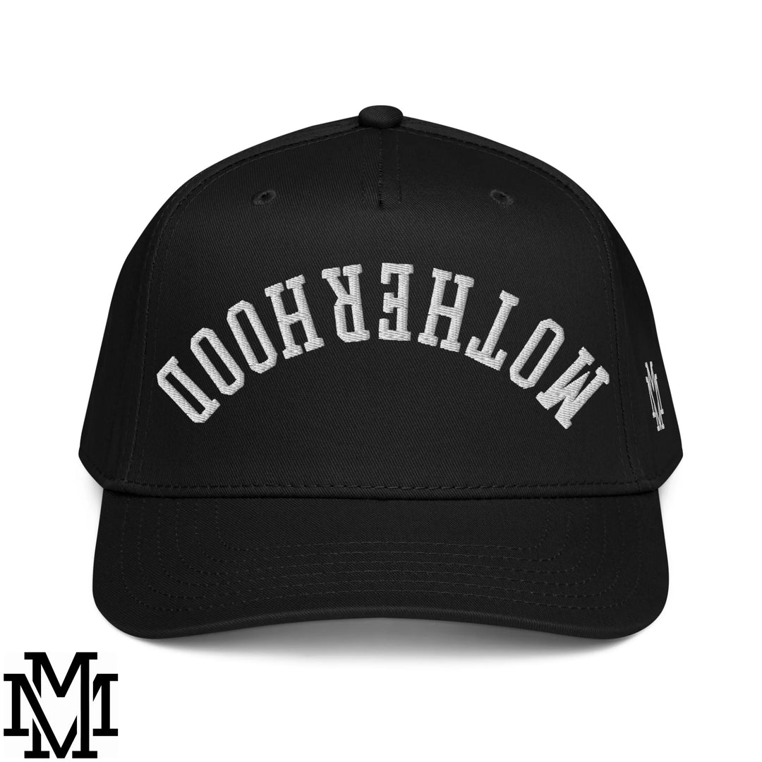 Black baseball snapback hat with white embroidered motherhood text and adjustable closure for casual wear